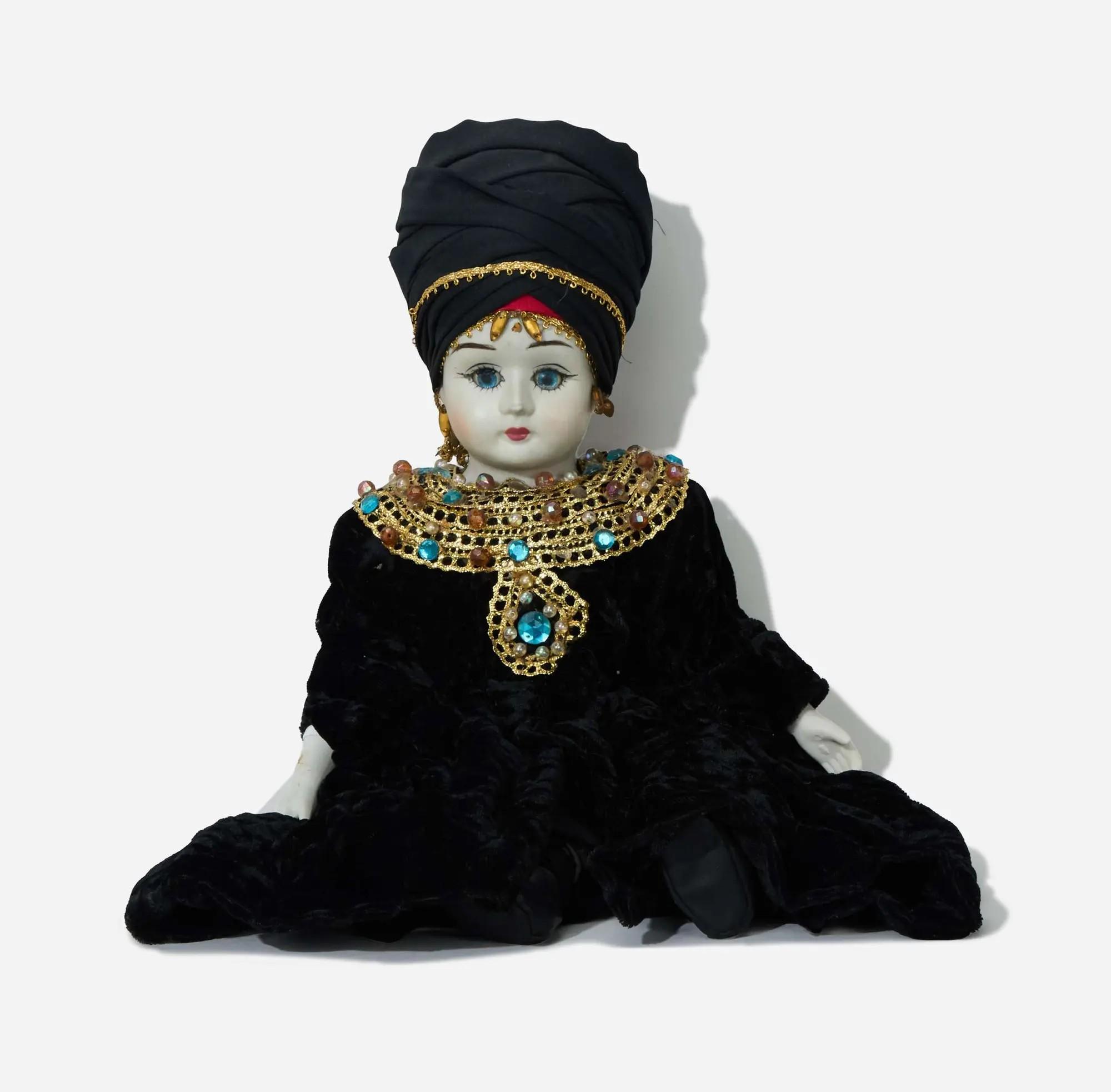 Lot #27  Boy George Boy George Egyptian Porcelain Doll (With Image)