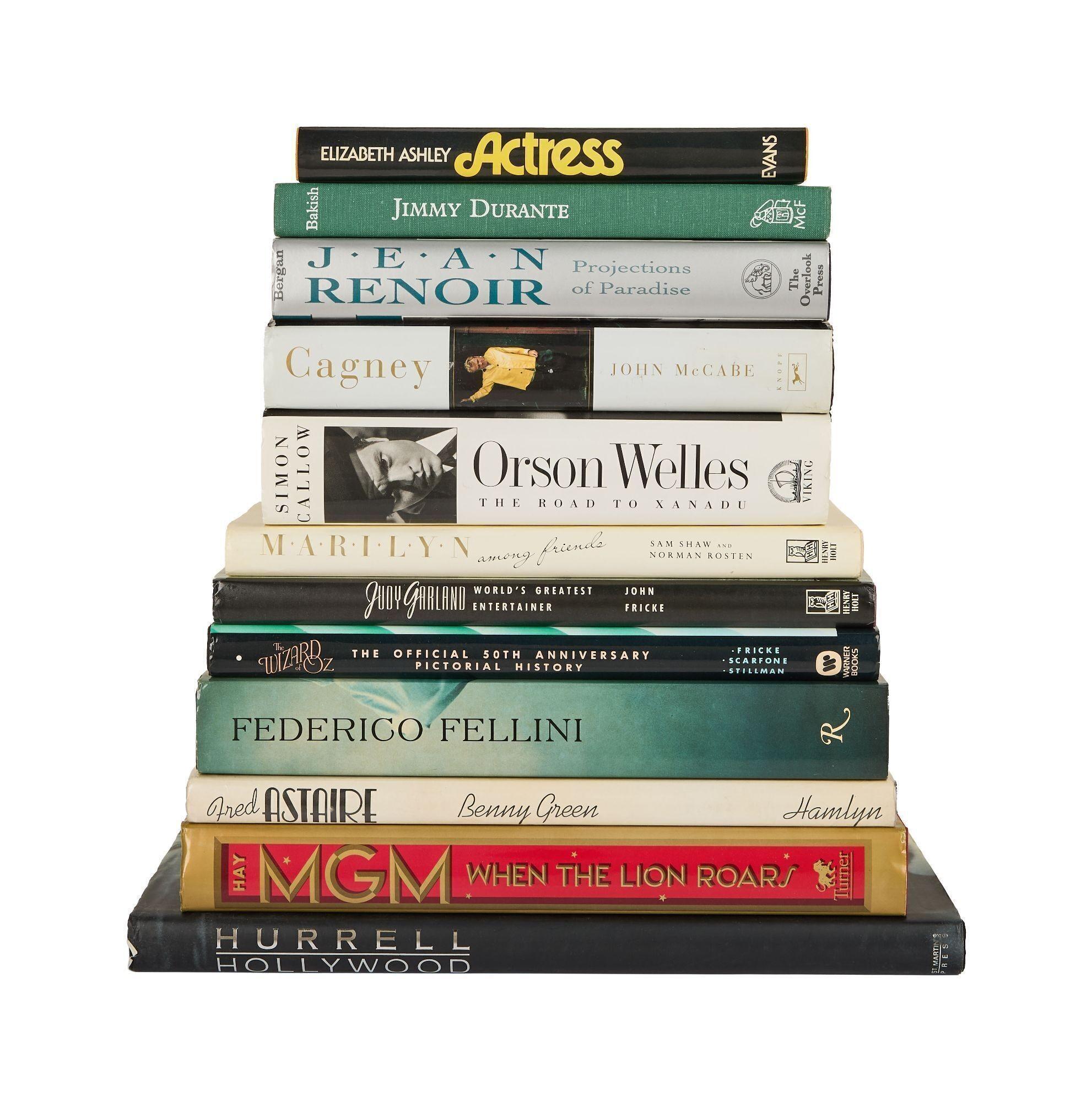 a stack of books including mgm when the lion roar