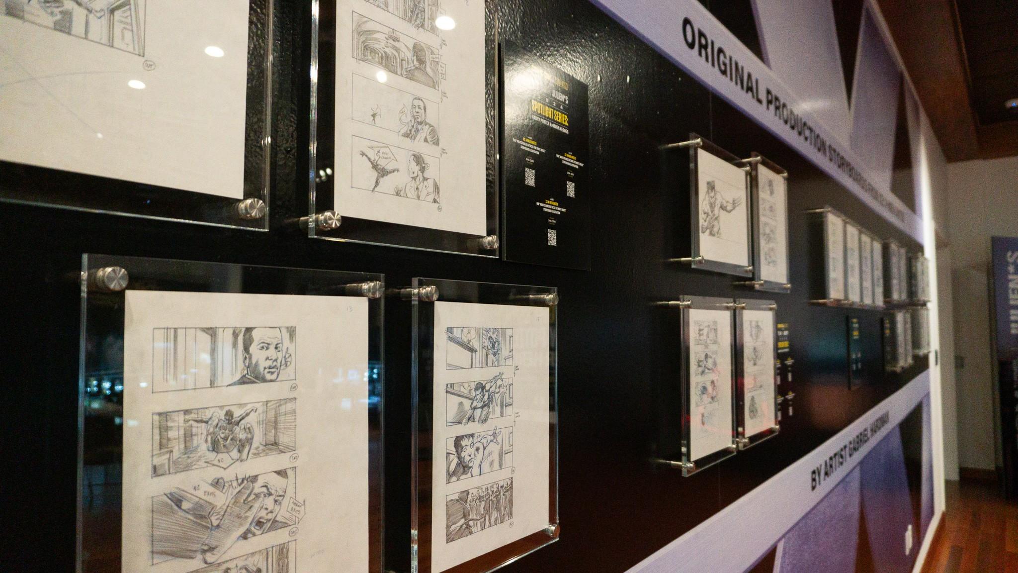 a wall with a lot of drawings on it .
