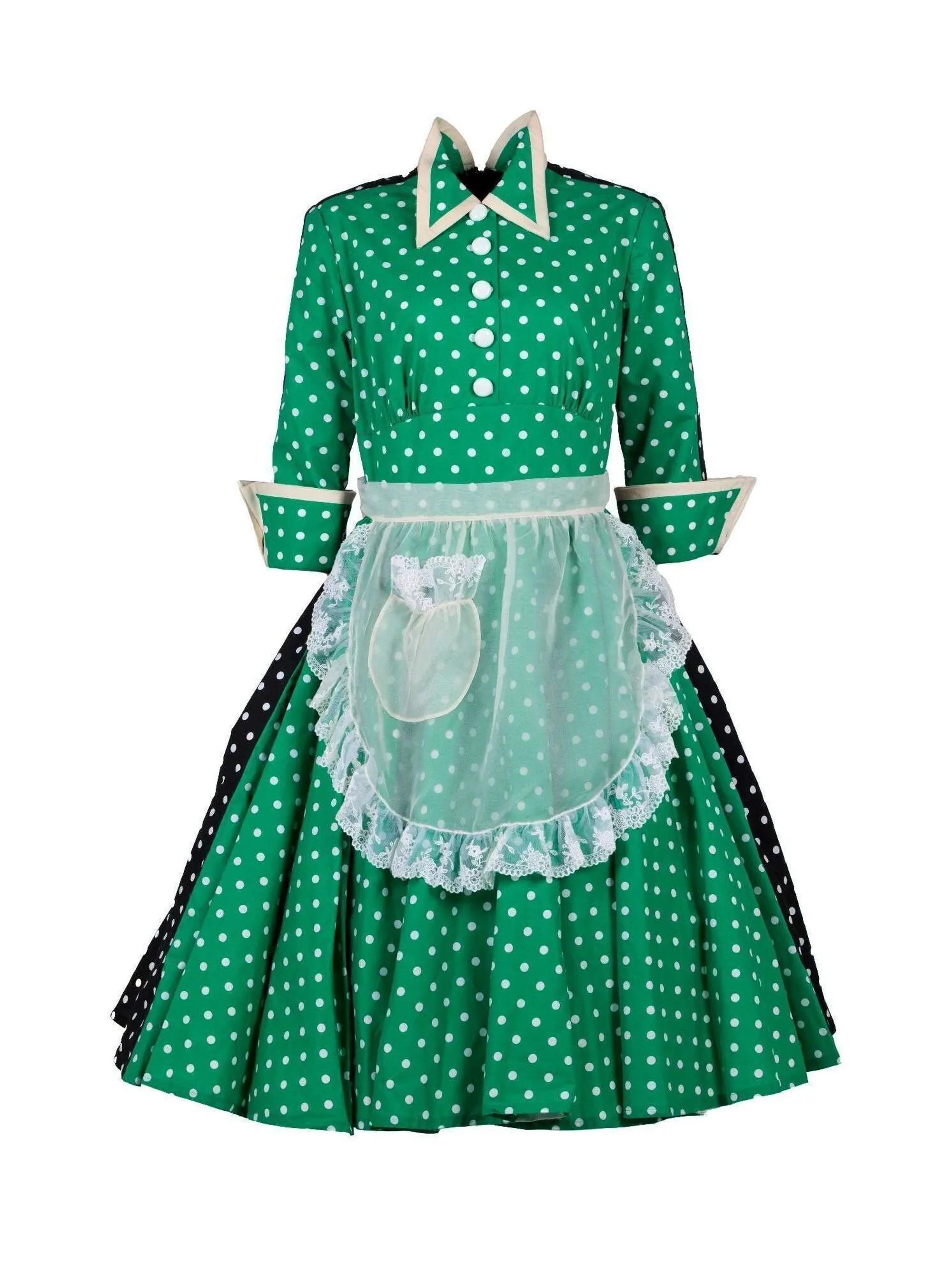Lot #2. Whoopi Goldberg | 1999 Bob Mackie-Designed Academy Award Costume A green dress with white polka dots, a white collar, white cuffs, and a white lace-trimmed apron.