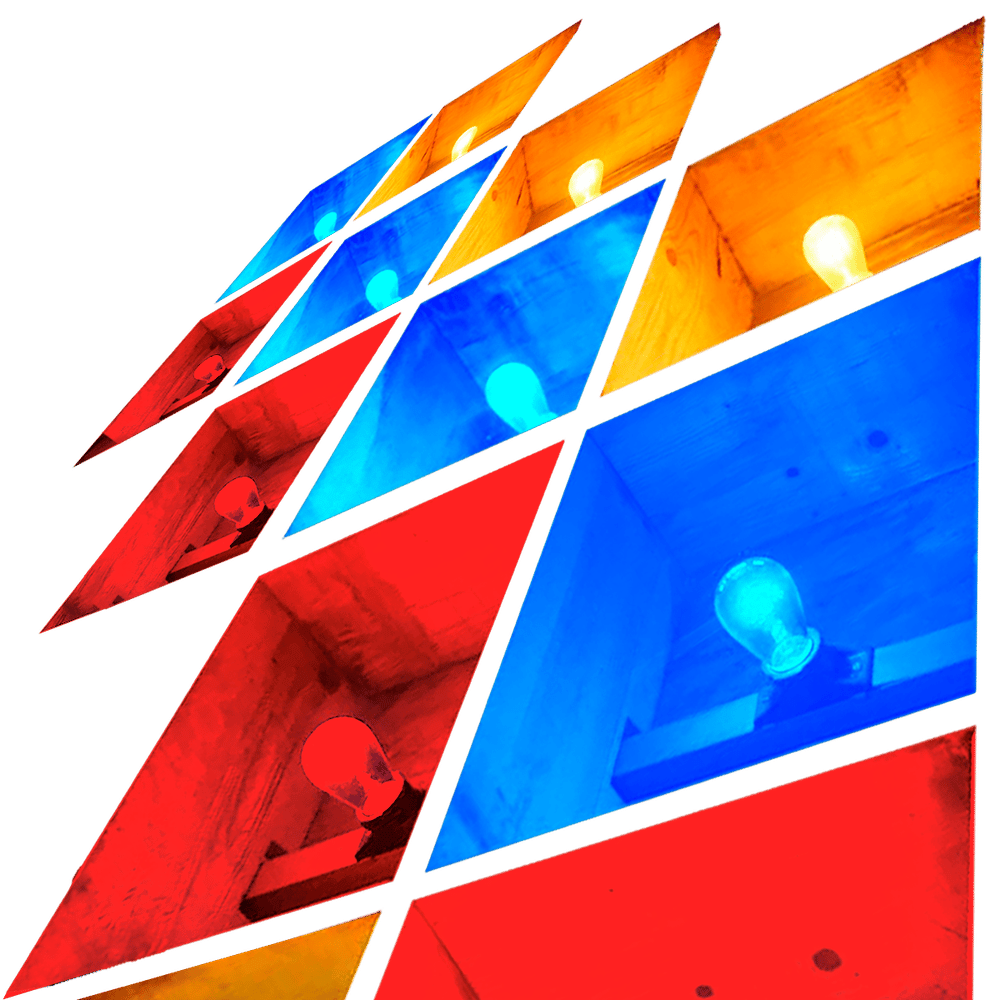 a colorful cube with a light bulb in the middle