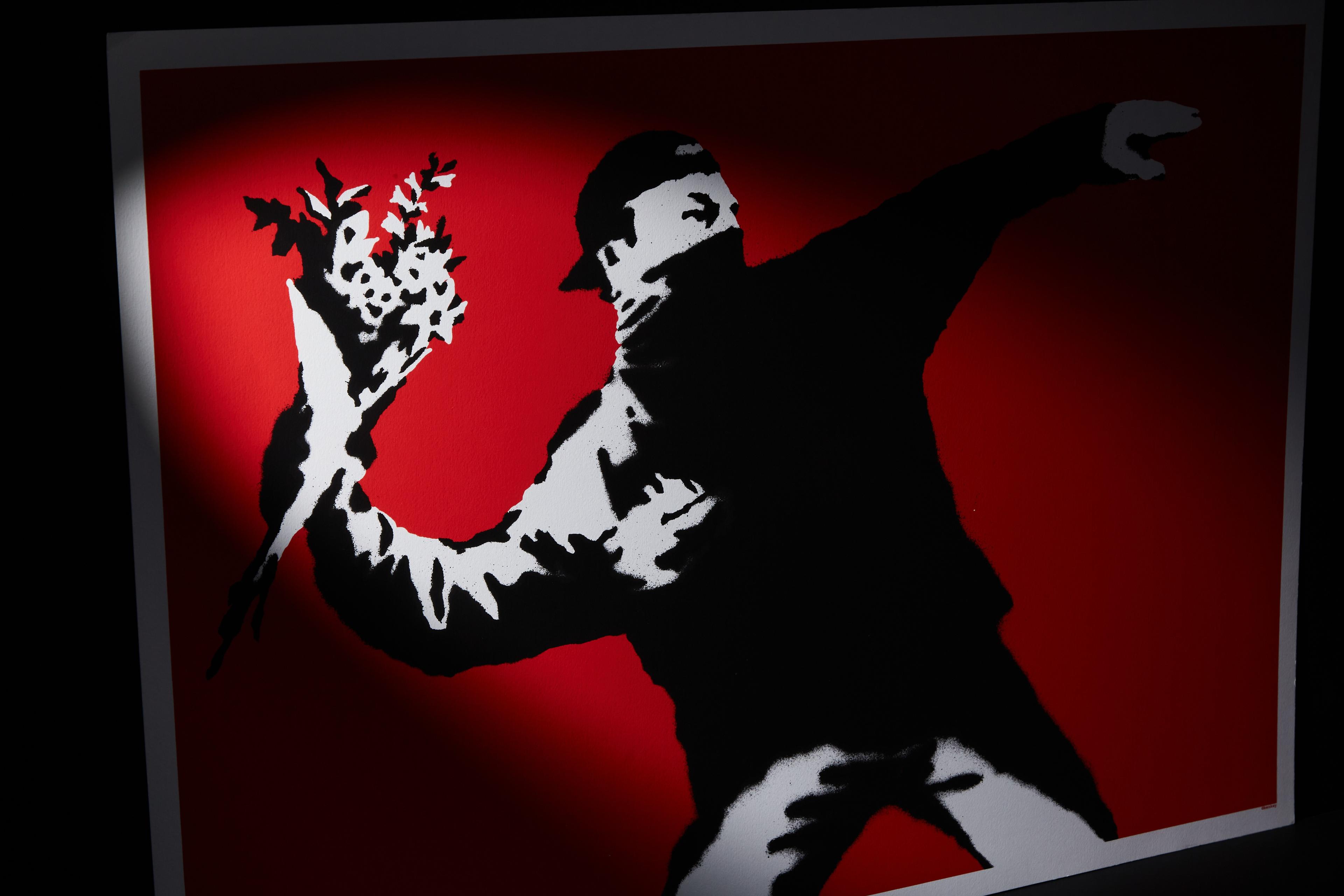 a painting of a man throwing flowers in the air on a red background .