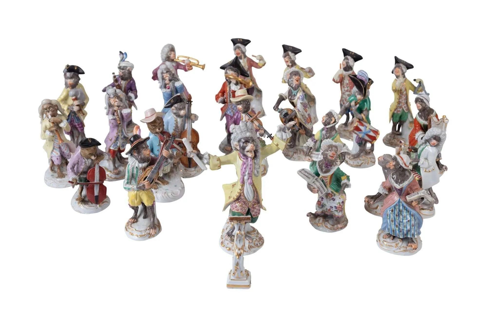 Lot #294. Whoopi Goldberg | 24 Piece Antique Meissen Monkey Band a set of 24 meissen monkey band figurines