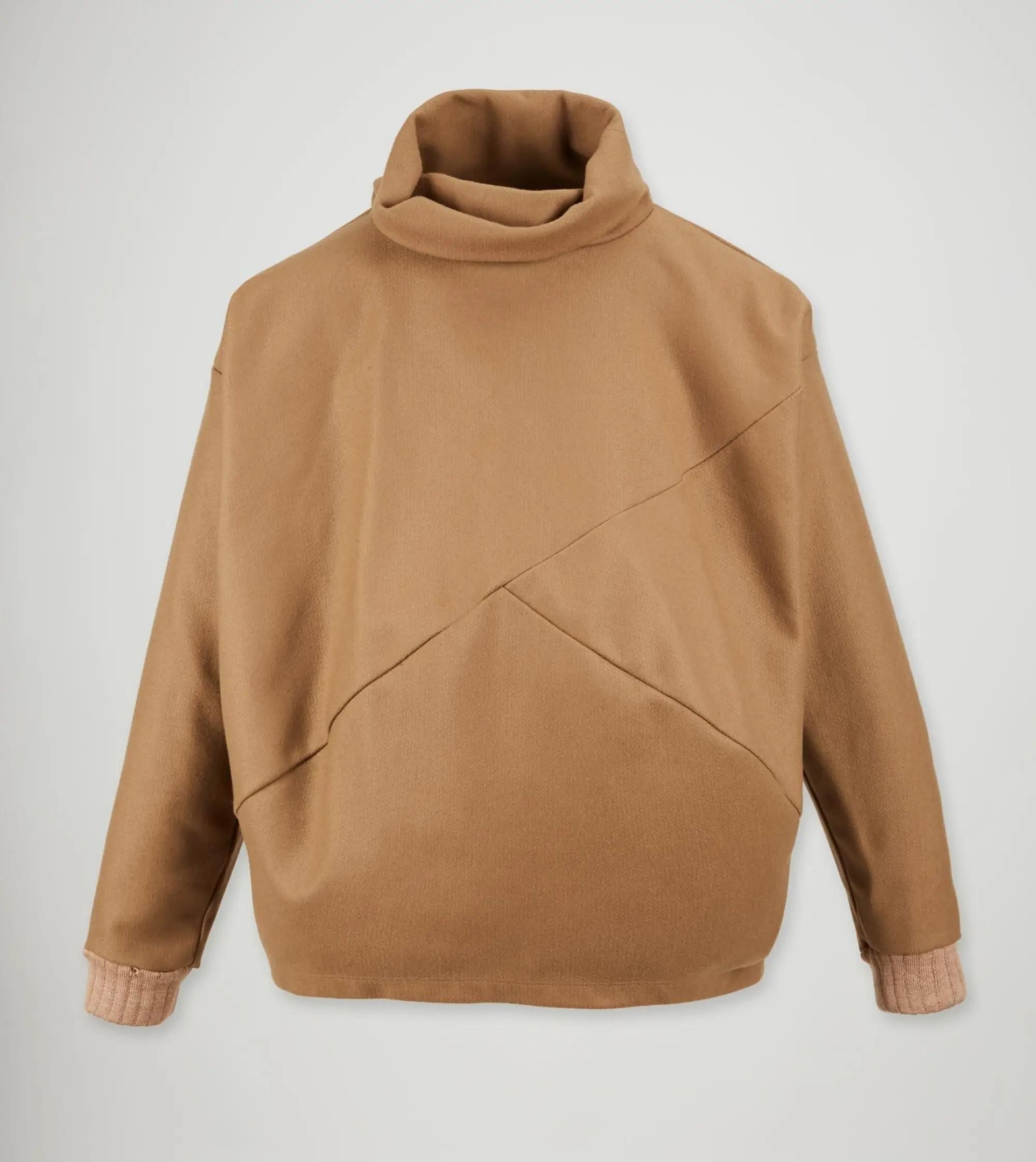 a brown sweater