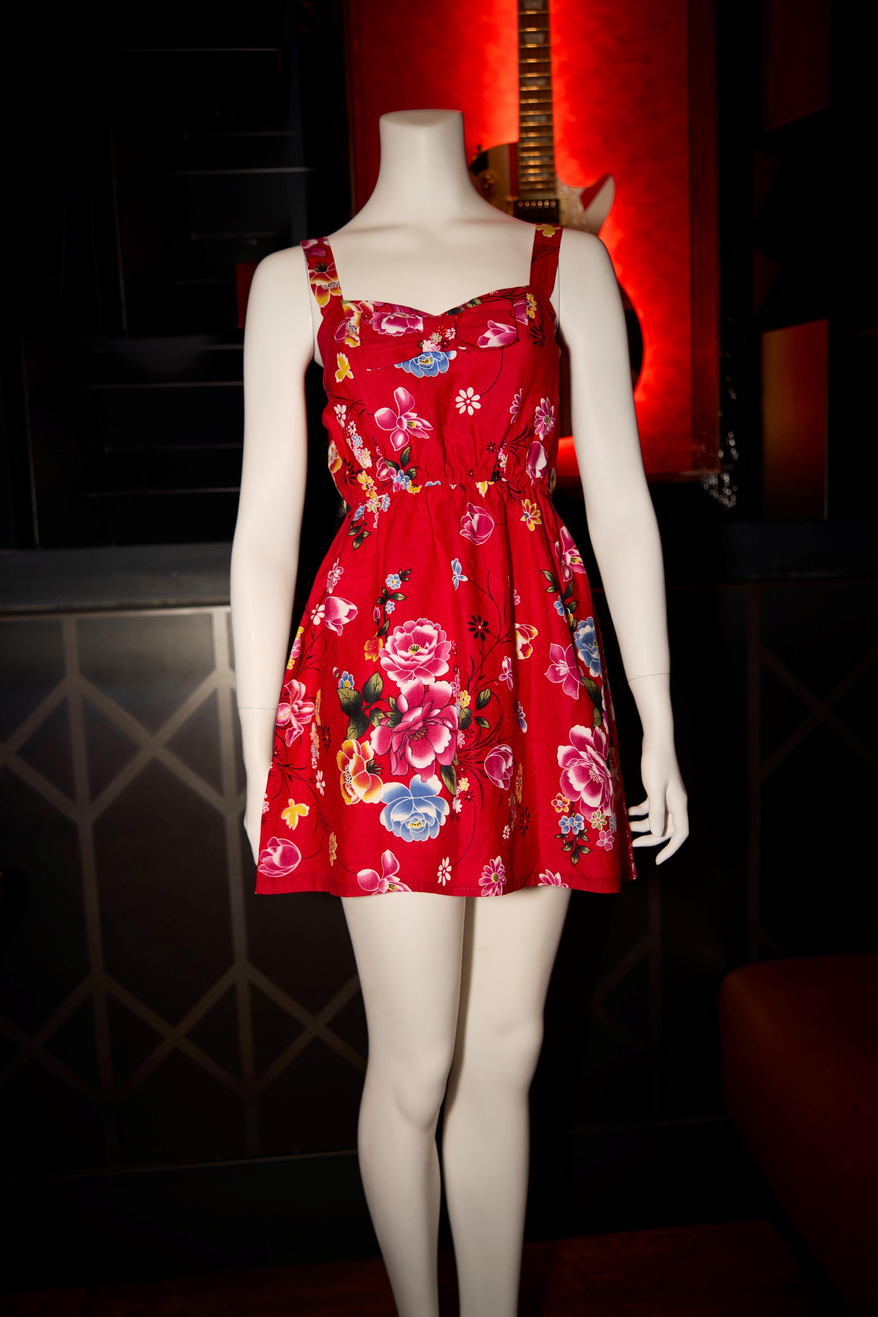 a red dress on a mannequin