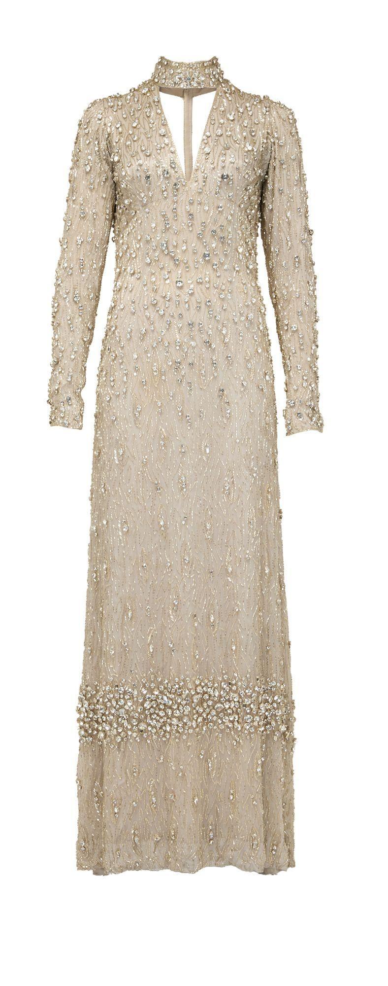a champagne colored beaded gown