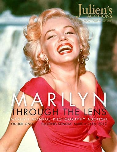 A poster for Julien's Auctions showing Marilyn Monroe