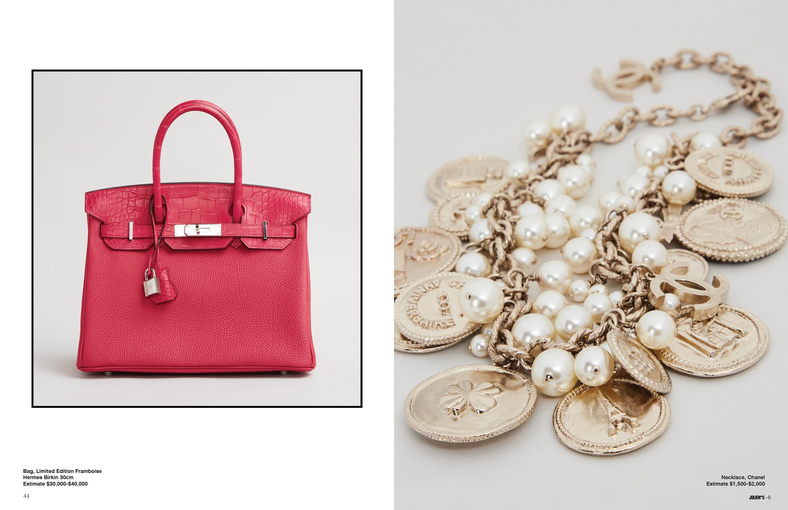 a pink purse and a gold necklace with pearls and coins .