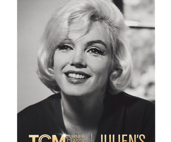 A film strip with three black and white photos of Marilyn Monroe smiling, overlaid with gold "Coming Soon" text.