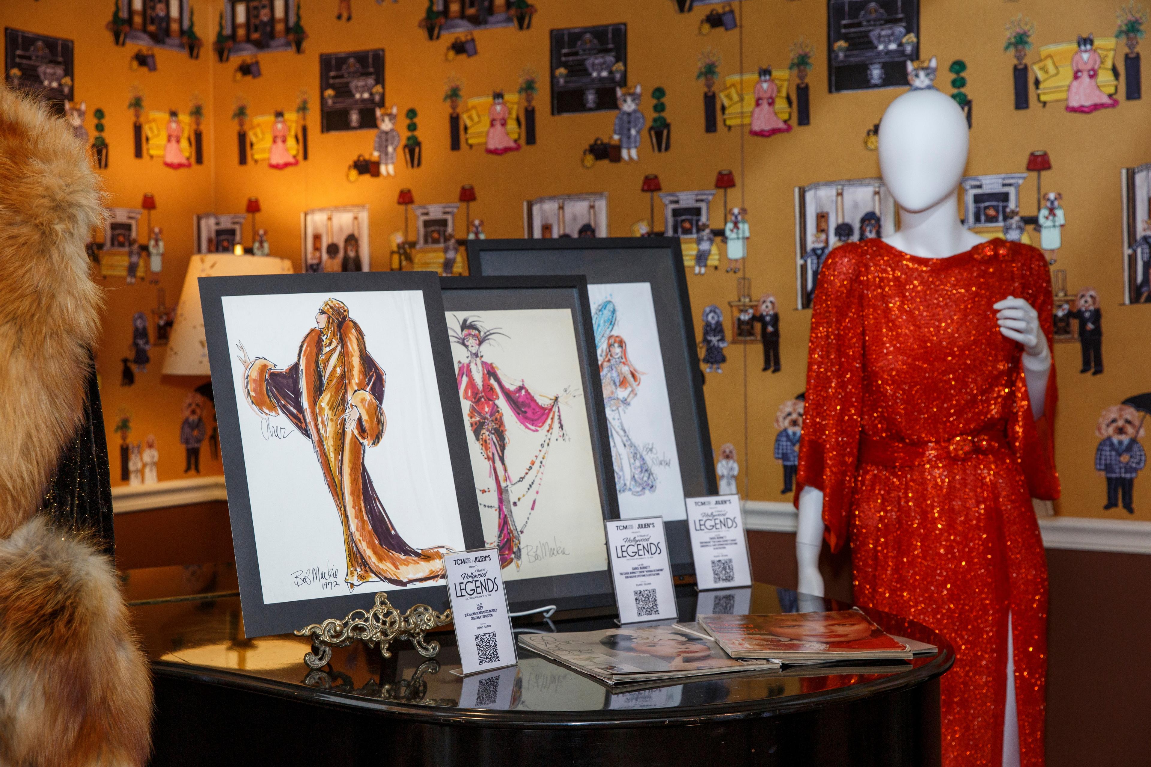 a mannequin in a red dress is standing next to a piano .
