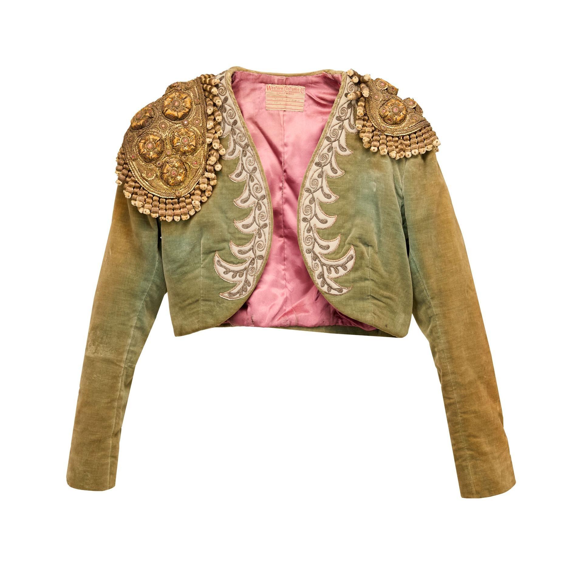 a green and pink matador jacket