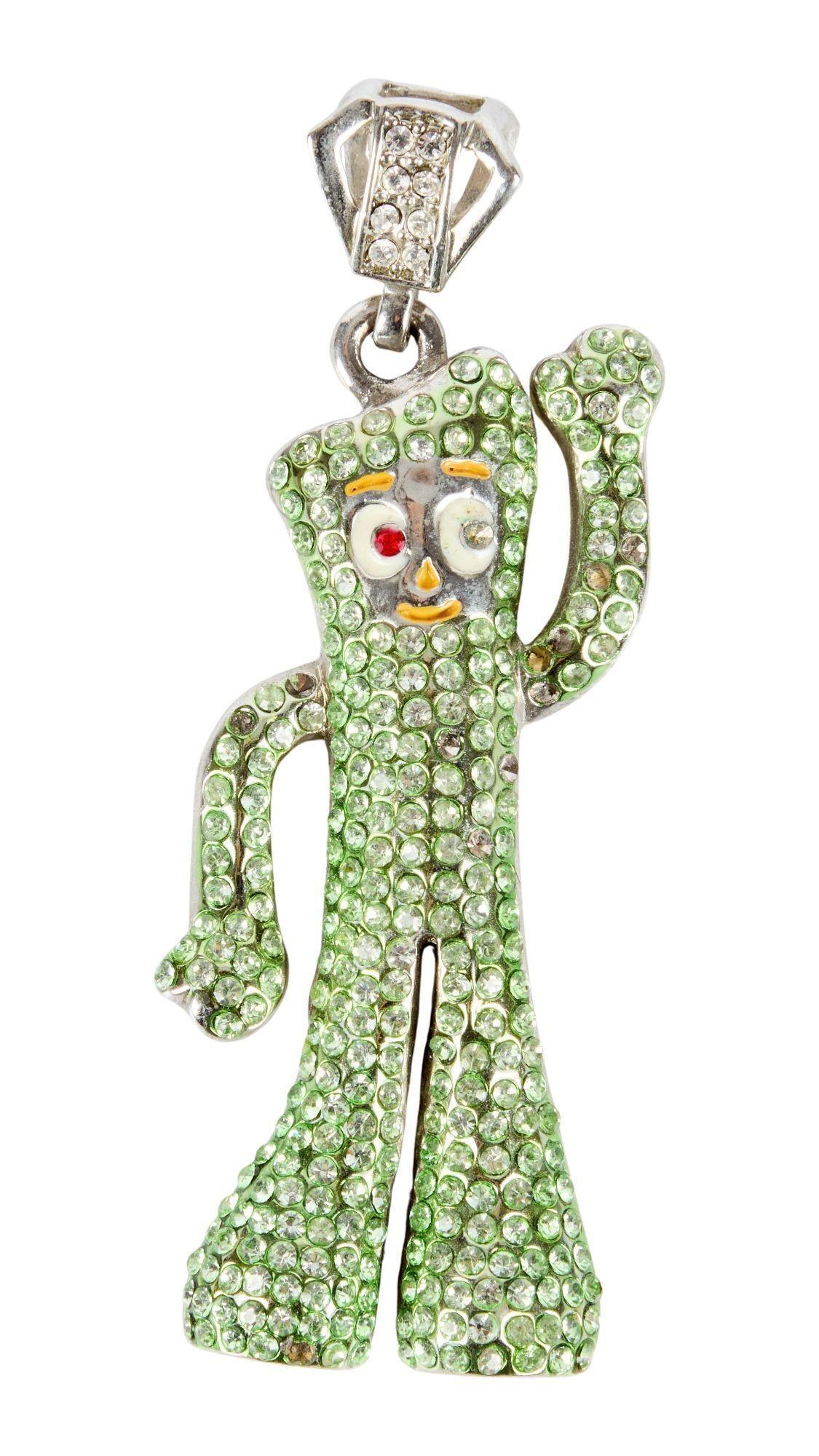 Lot #472. Angus Cloud | Photo-Worn Gumby Pendant a pendant in the shape of a cartoon character covered in green rhinestones