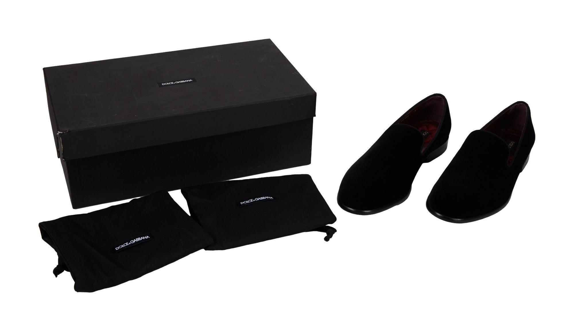 Lot #480. Angus Cloud | Dolce Gabbana Black Velvet Shoes With Box a pair of black shoes are sitting next to a black box .