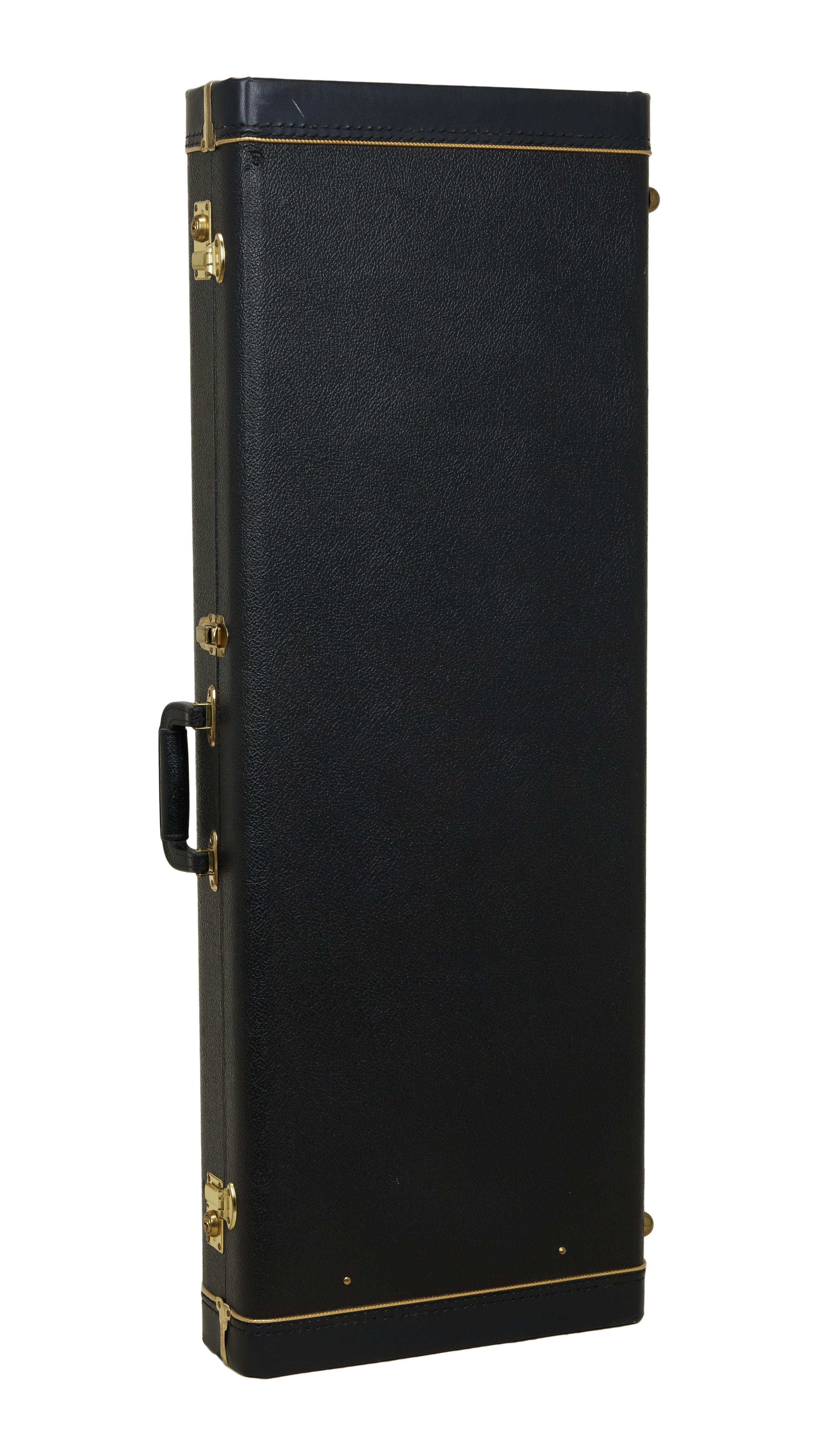 a black guitar case with gold trim and a handle