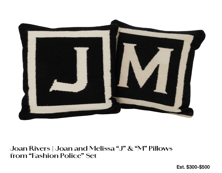 two pillows with j and m on them
