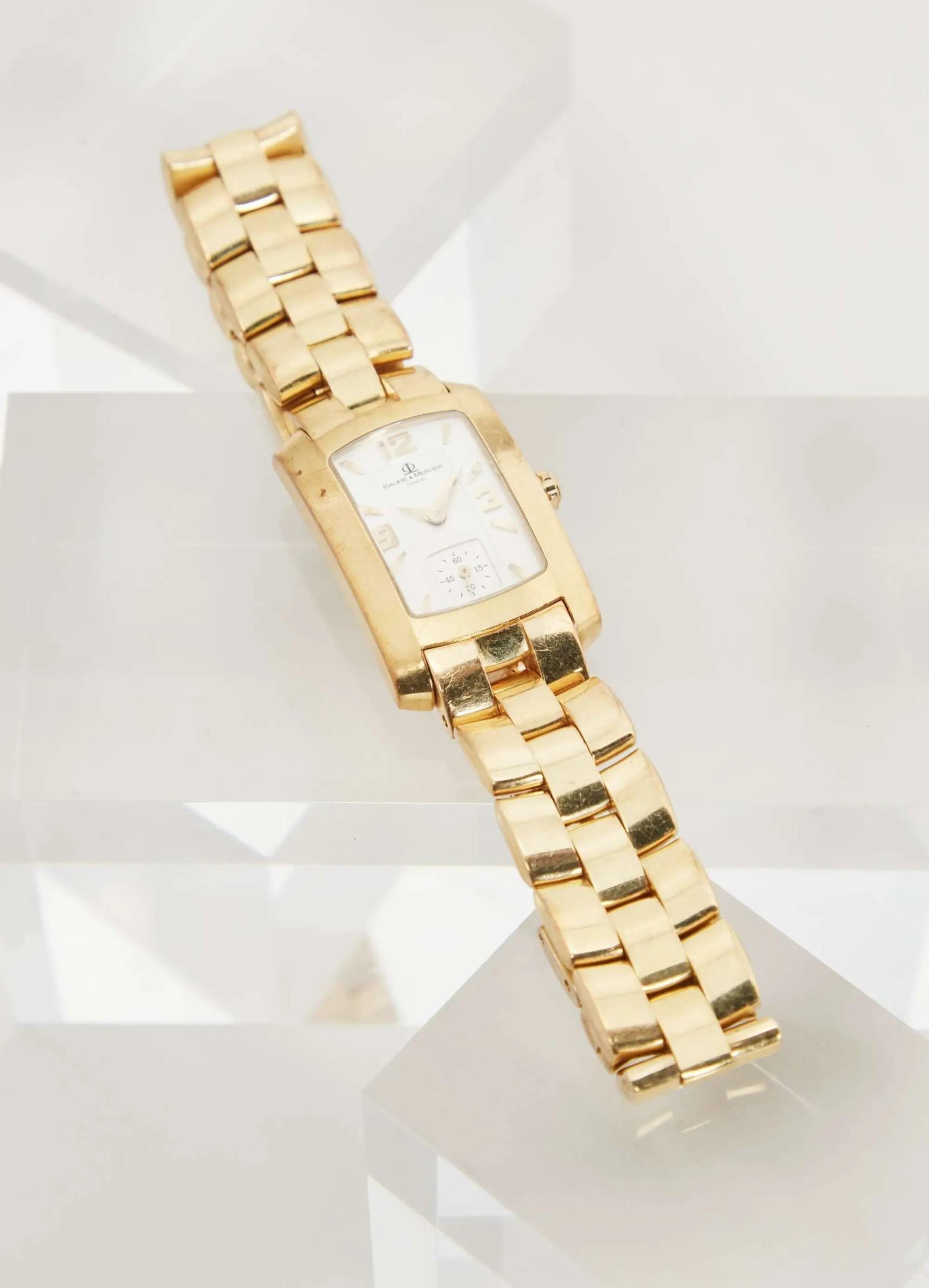 Lot 53 Gwyneth Paltrow  BAUME & MERCIER 18K Yellow Gold Hampton Milleis Wristwatch