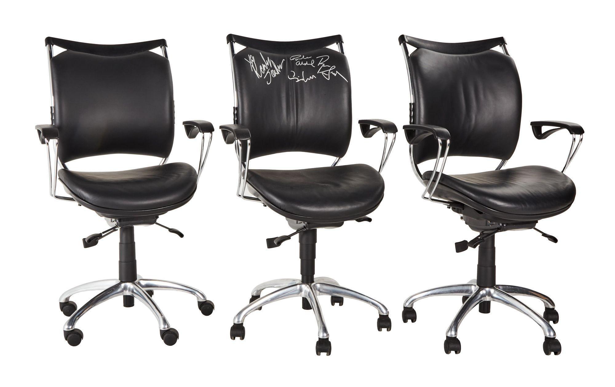 three leather chairs
