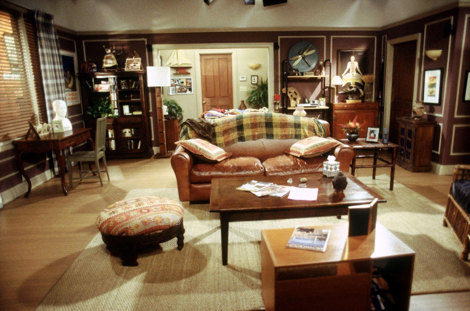 a living room filled with furniture and a couch .