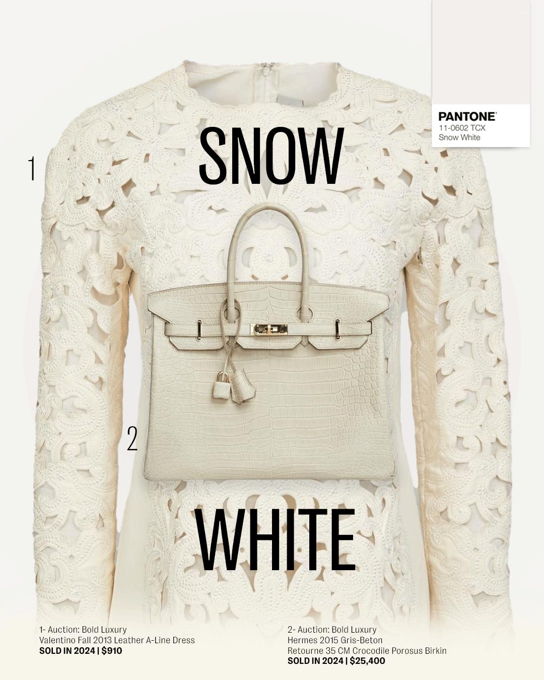a white purse with the word snow on it
