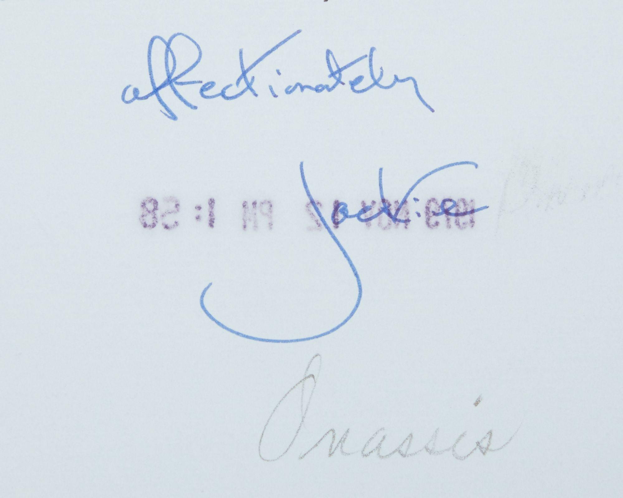 a close up of a signature on a piece of paper .
