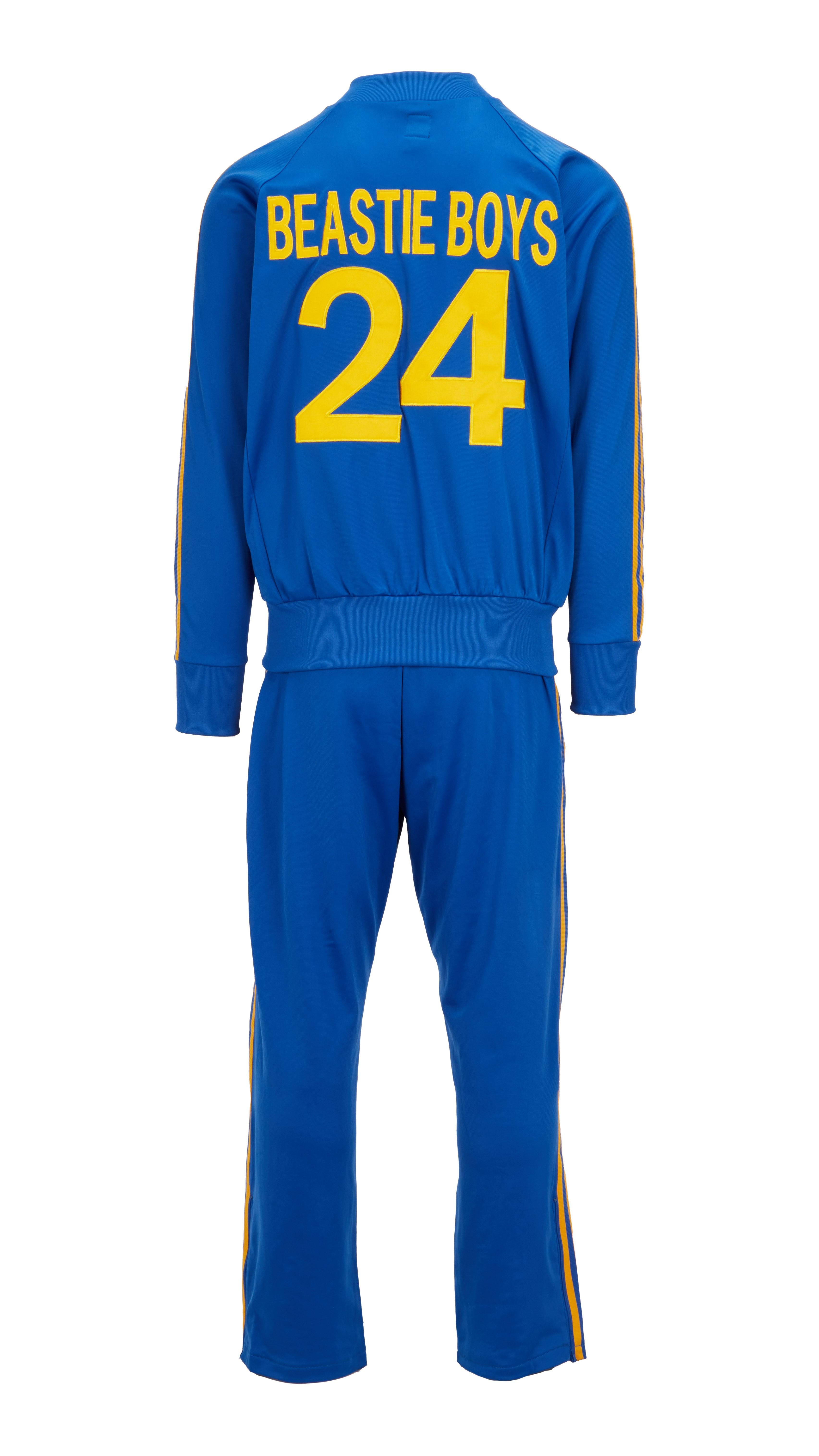 a blue tracksuit with the number 24 on the back