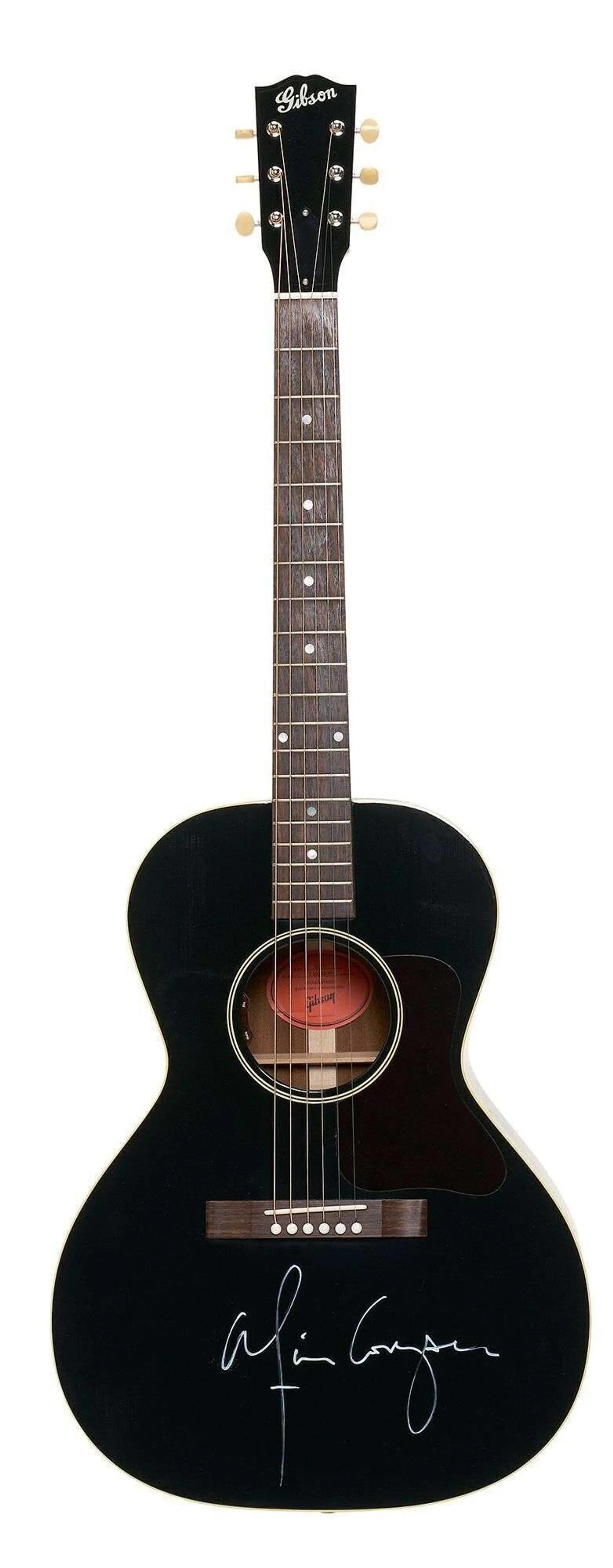 Lot #1. Alice Cooper | Signed Gibson L-00 Acoustic Guitar Ebony A black Gibson acoustic guitar signed by Alice Cooper.
