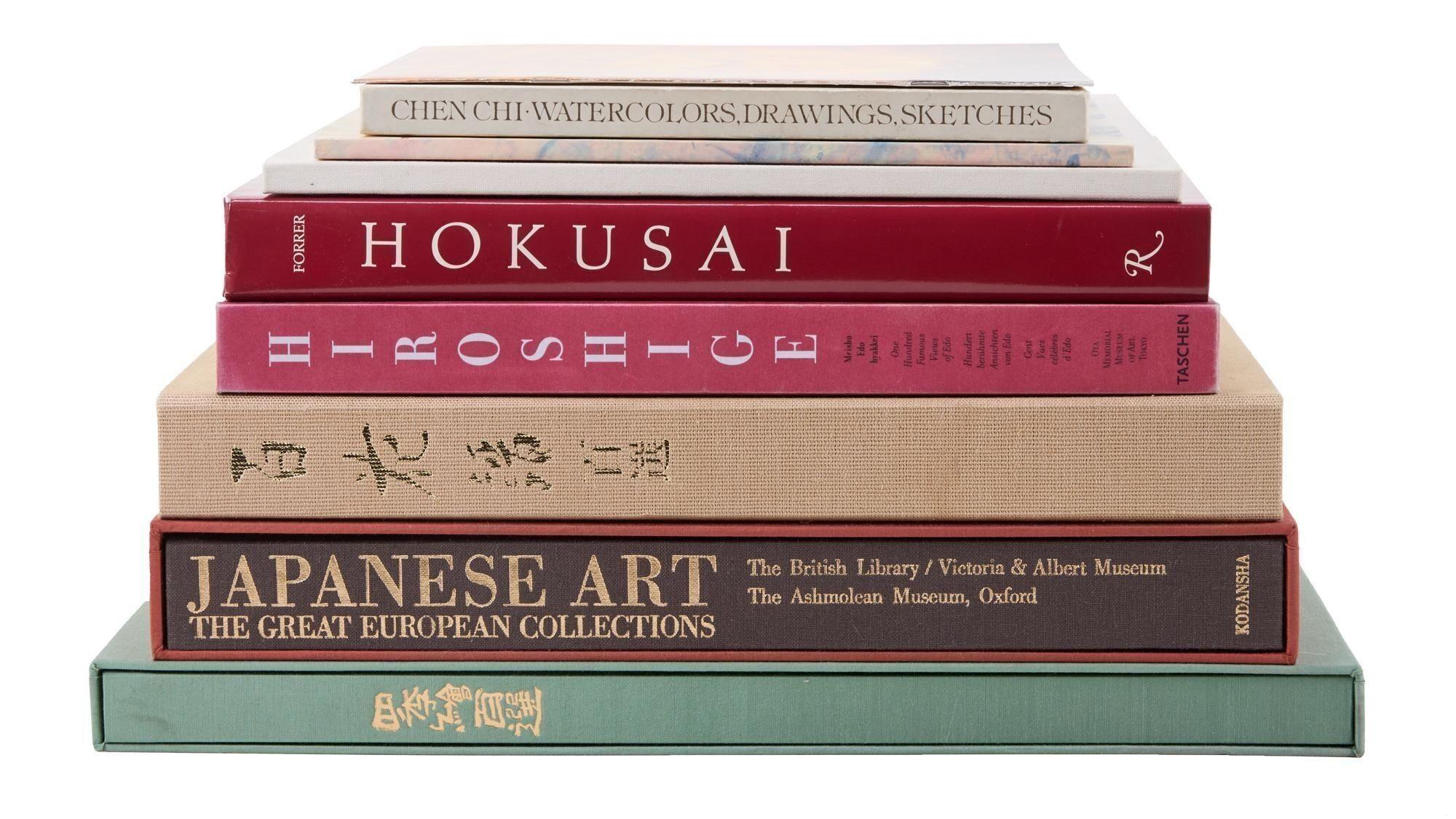 a stack of books on top of each other on a white background .