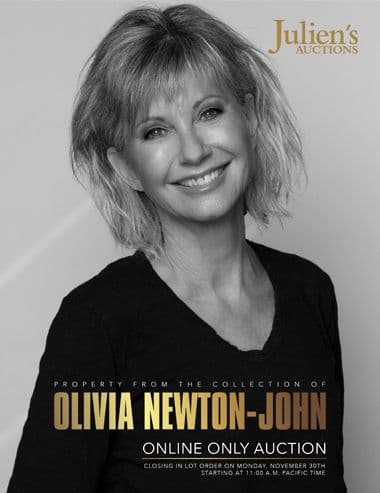 A black and white photo of Olivia Newton-John for Julien's Auctions