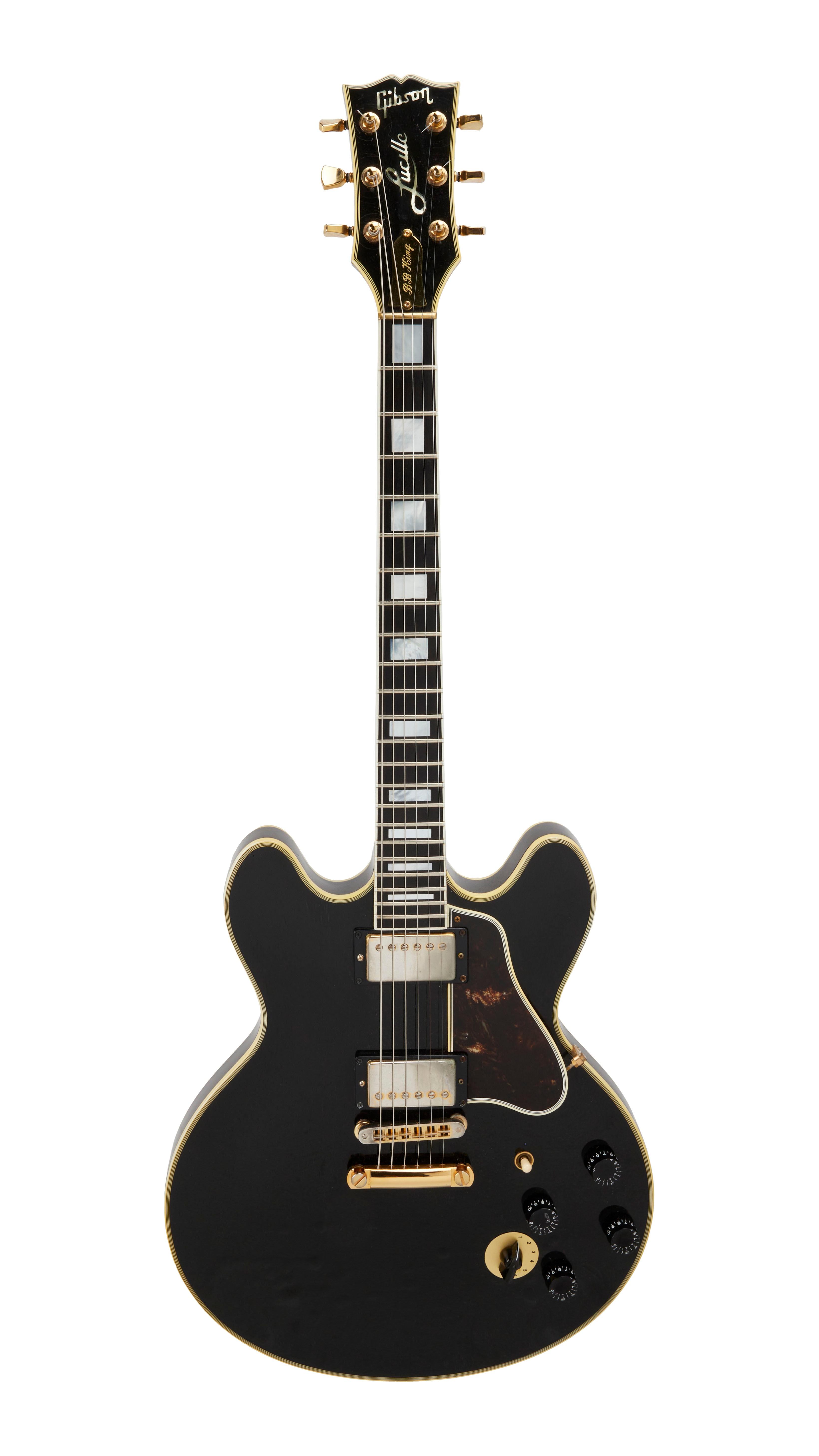a dark colored bass guitar