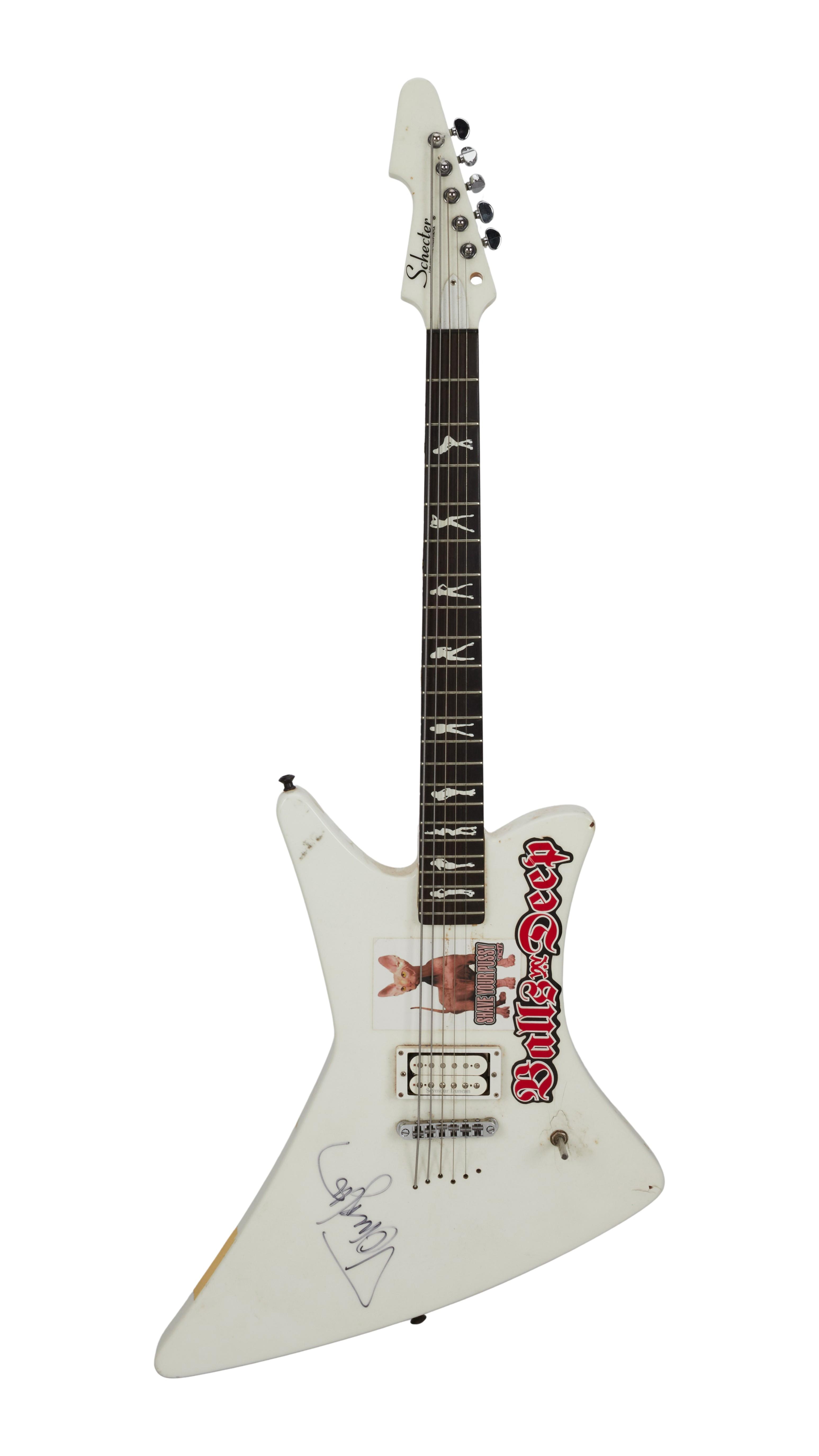 a signed white bass guitar