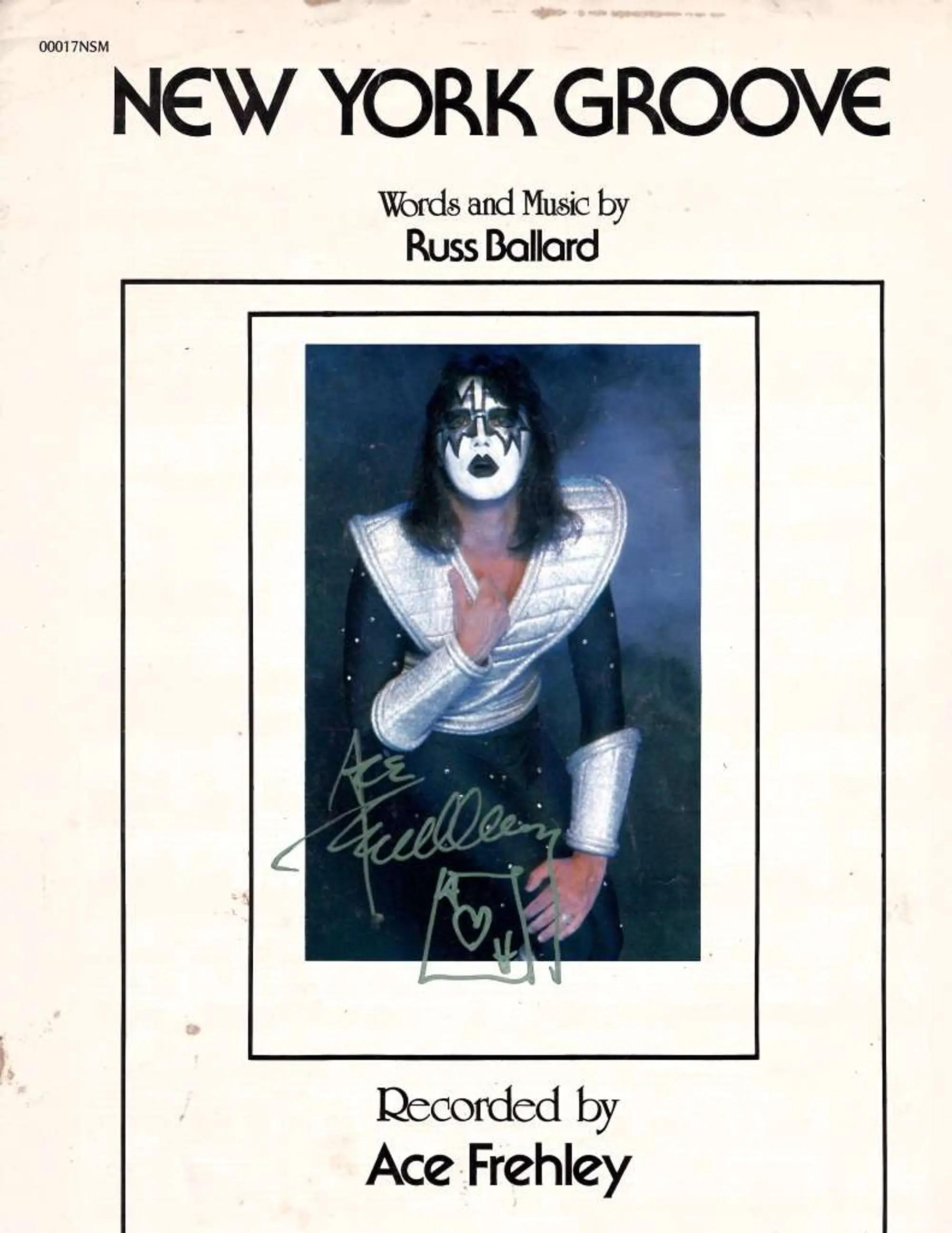 Lot #518 KISS Ace Frehley Life-Size Destroyer Costume Mannequin with Signed Sheet Music