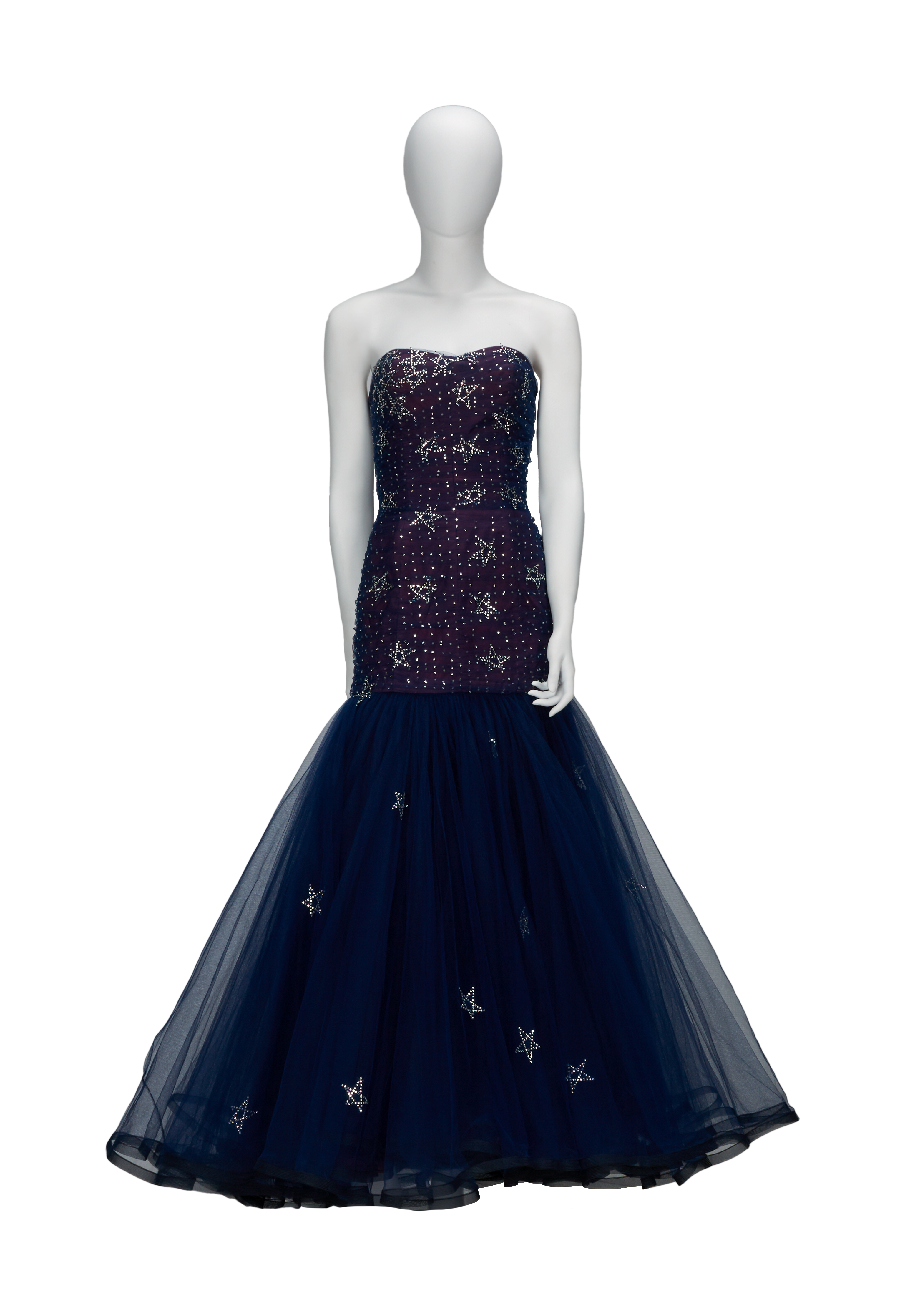 a mannequin is wearing a blue dress with stars on it