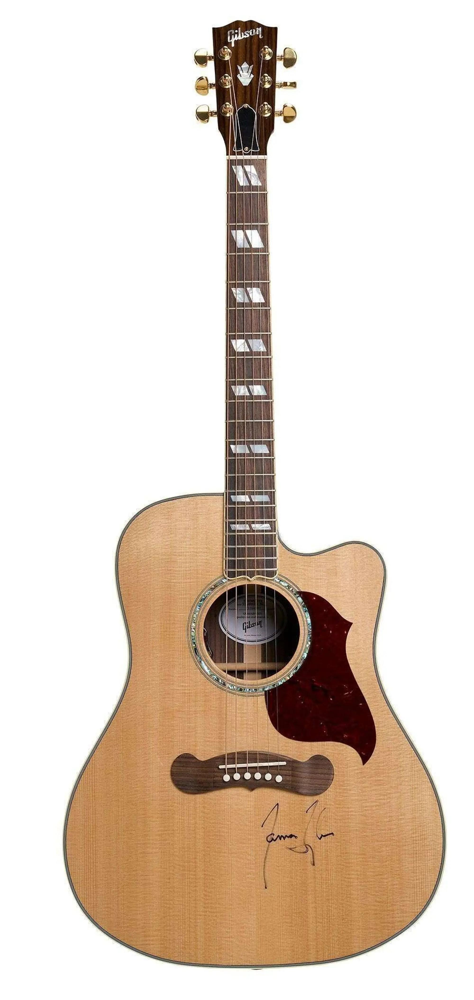 Lot #13. James Taylor | Signed Gibson Songwriter Standard EC Rosewood Acoustic Guitar Natural wood Gibson acoustic guitar with a cutaway body, diamond fretboard inlays, dark pickguard, and a signature on the lower body.