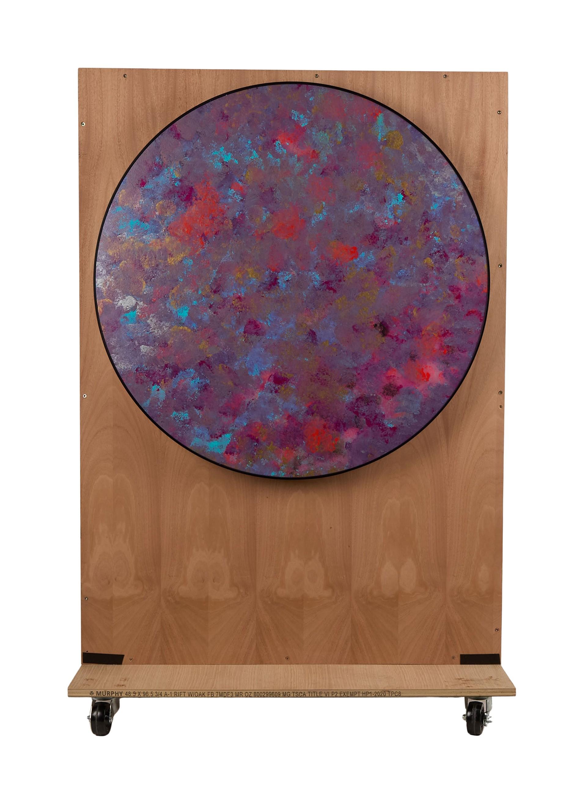 a purple and blue painting on a wooden board