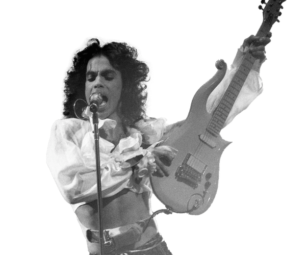 a man singing into a microphone while holding a guitar