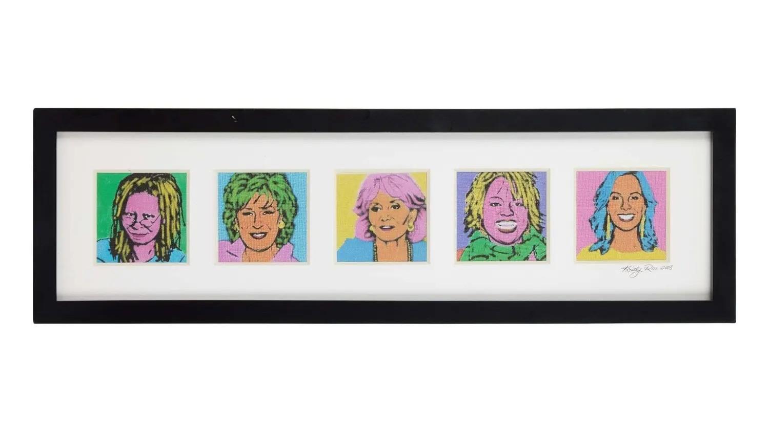 Black-framed artwork featuring five pop-art style portraits of women with brightly colored hair and backgrounds.