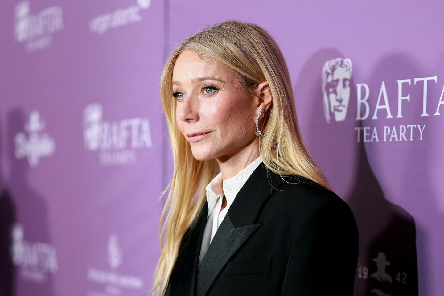 gwyneth paltrow on a red carpet at bafta tea party