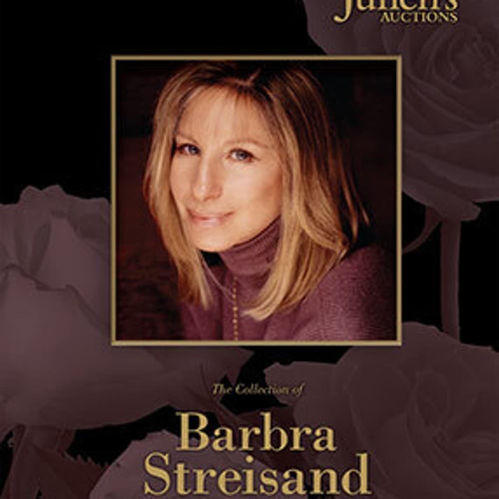 A poster for Julien's Auctions featuring a picture of Barbra Streisand