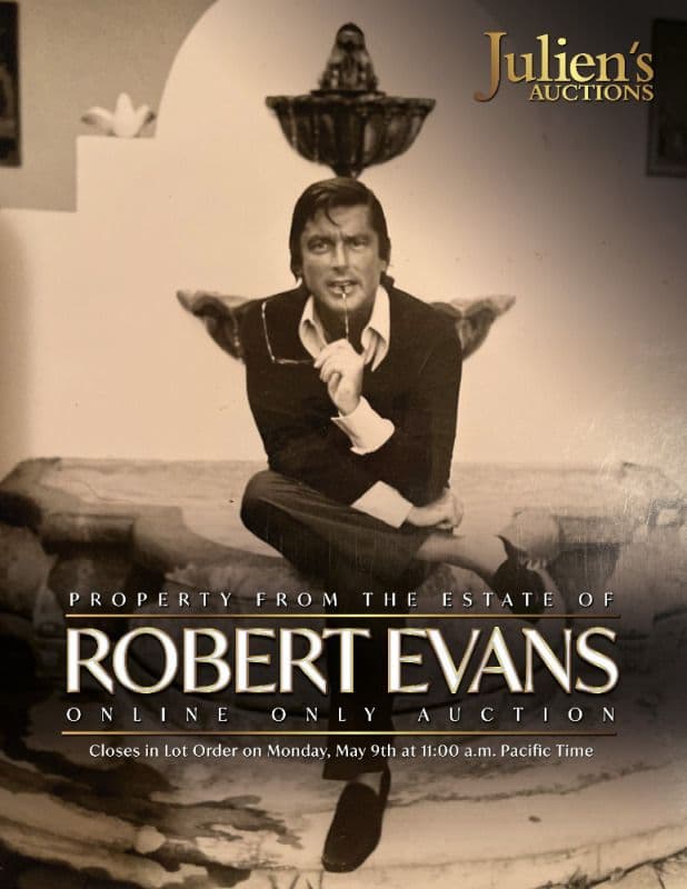 A poster for Julien's Auctions showing Robert Evans