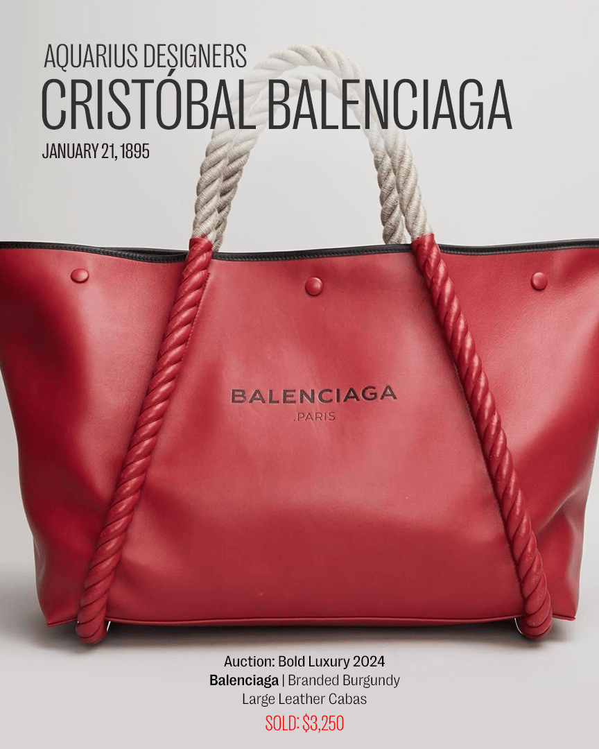 a red balenciaga bag with a rope handle