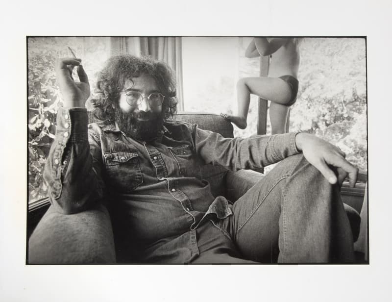 a black and white portrait photo of Jerry Garcia