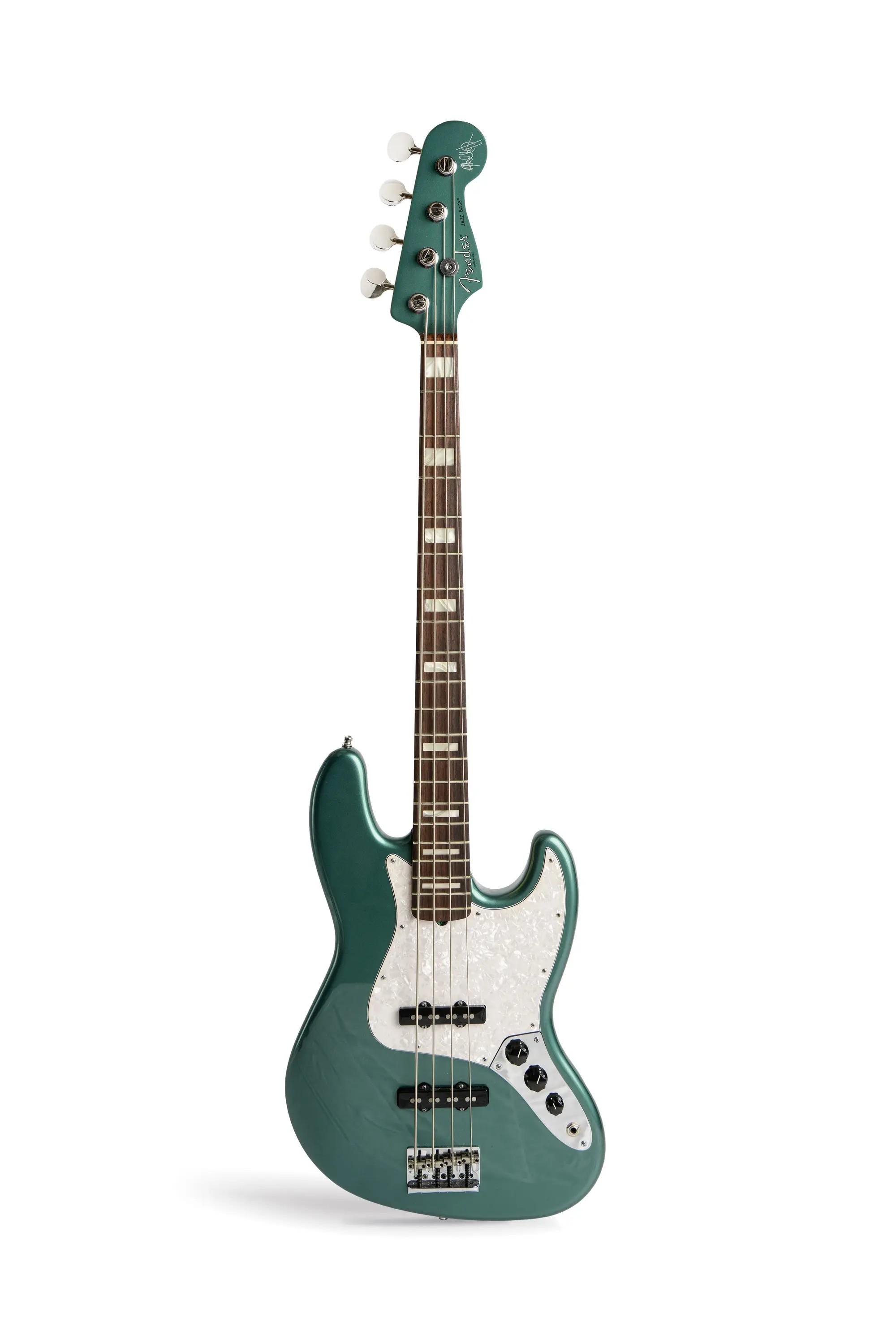 Lot #406. Adam Clayton | Stage Played 2014 Warwick Streamer Electric Bass, White with Black Pickguard Lot #406 Adam Clayton Stage Played 2014 Warwick Streamer Electric Bass, White with Black Pickguard