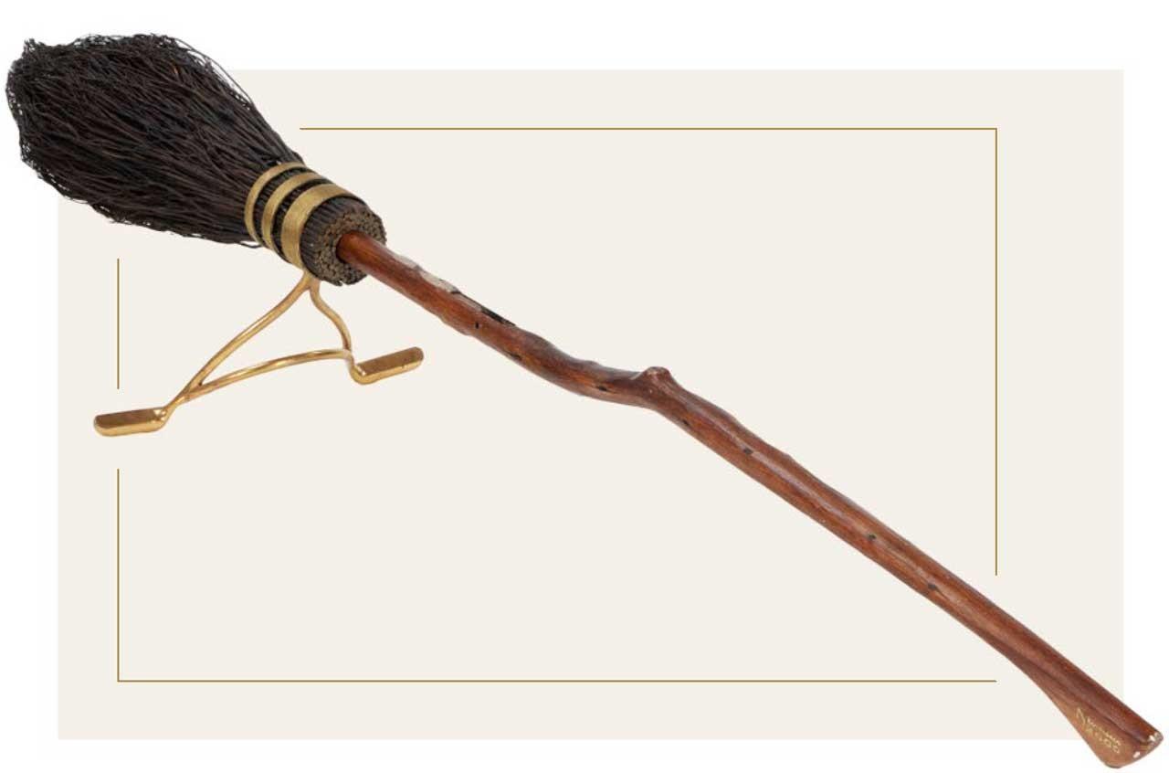 One of the Harry Potter film prop brooms on display at Julien's Auctions