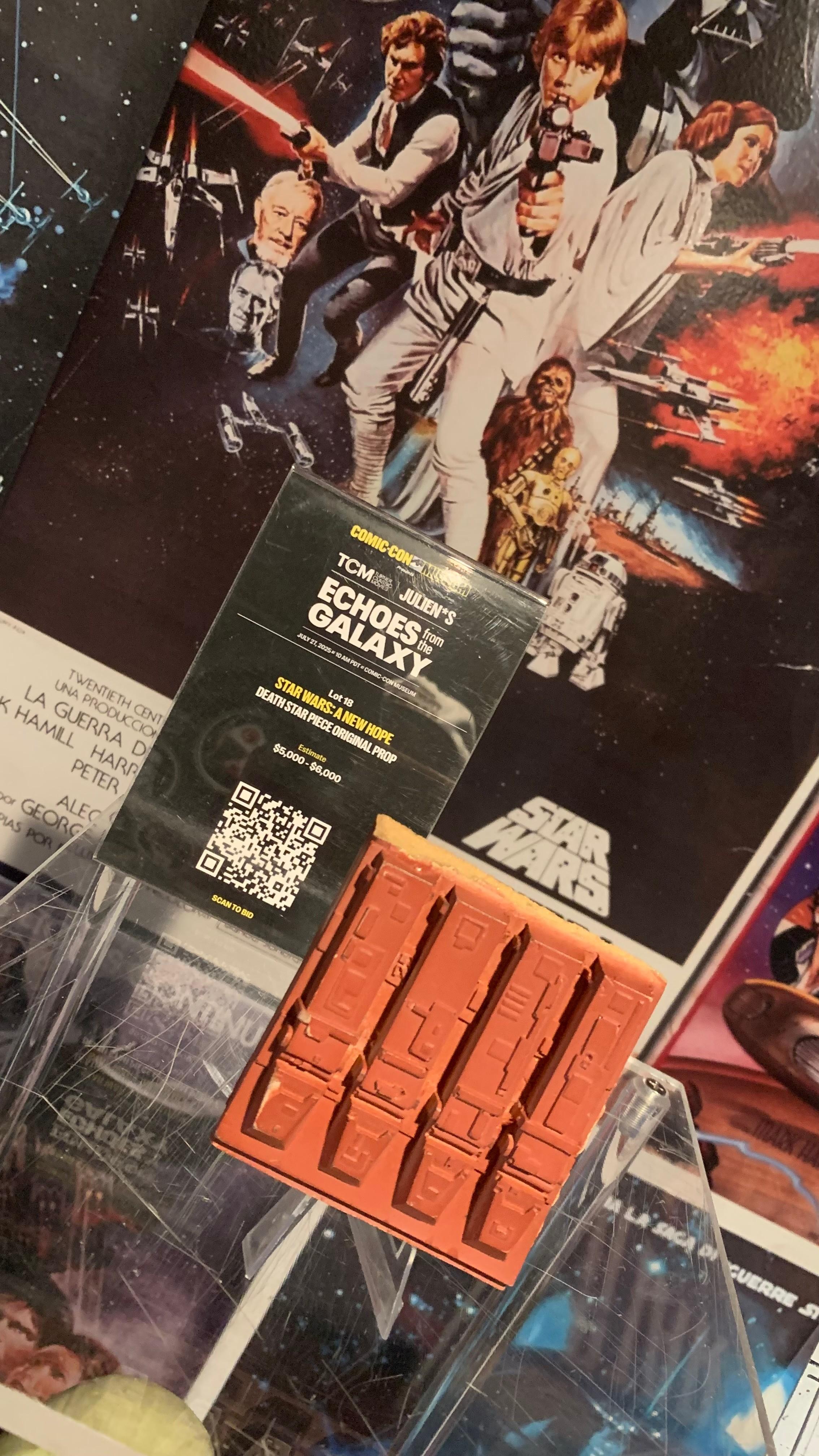 a star wars artifacts on display at the comic con museum