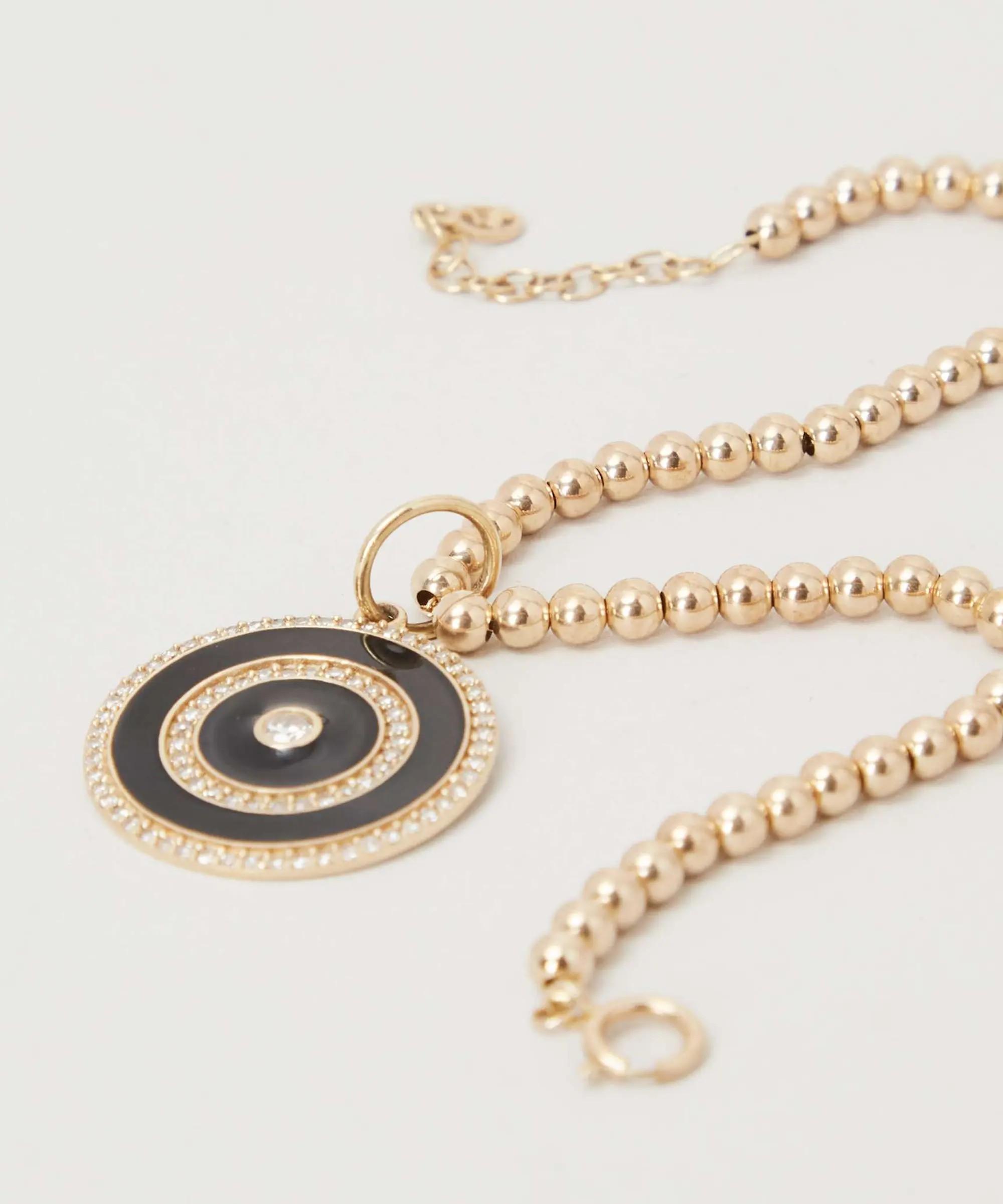 Lot 50 Gwyneth Paltrow 14k Gold Beaded Bracelet with Pendant