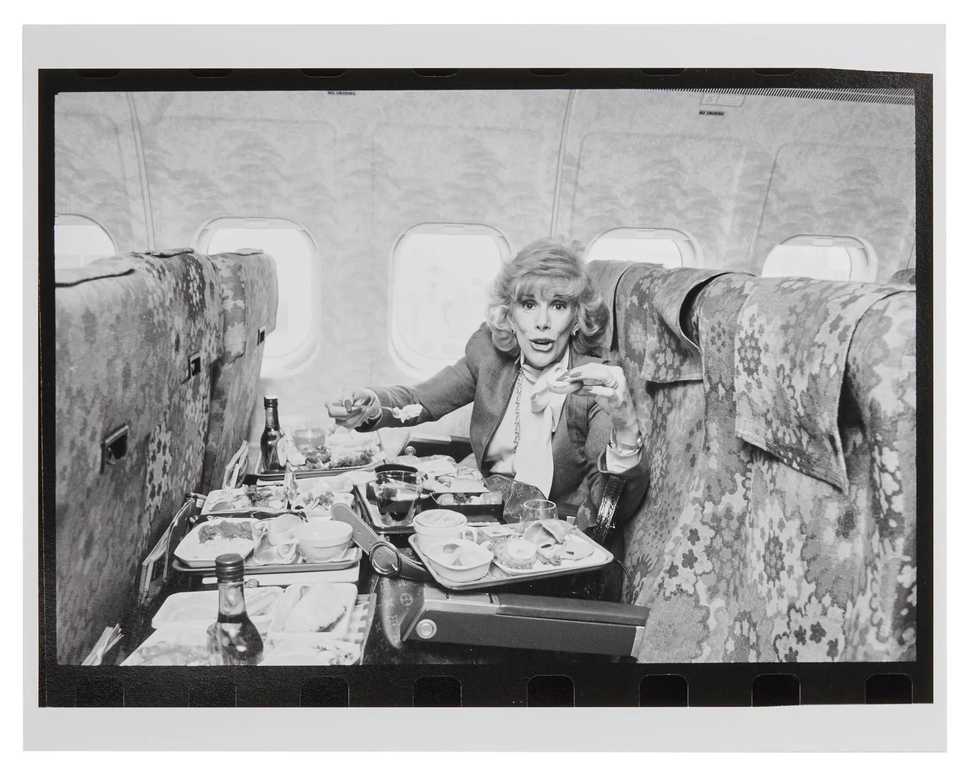Lot 21 Joan Rivers Two Black and White Prints from 1980s Joan Rivers Air Travel Photoshoot