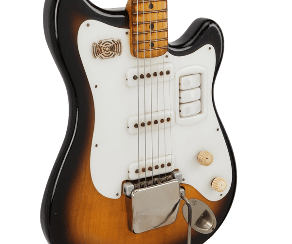 a brown and white electric guitar with a black background