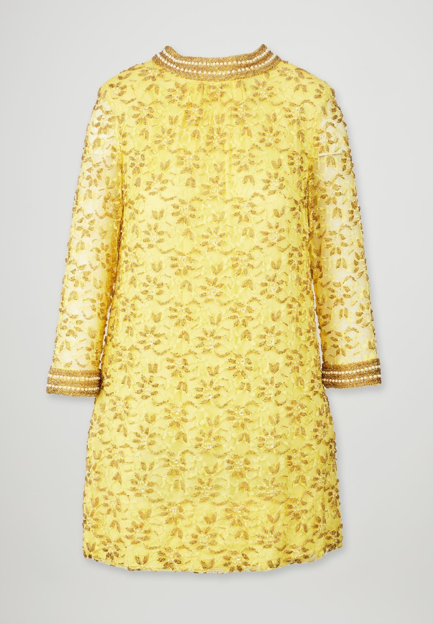 Lot #33. Elizabeth Taylor | Yellow Beaded Embellished Floral Lace Mini Dress a yellow lace dress with pearls on the collar and sleeves