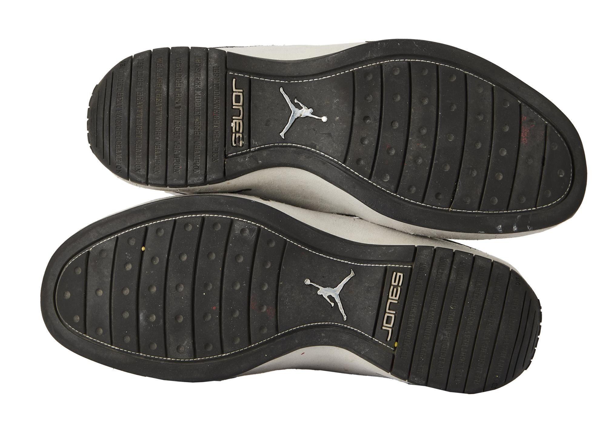 the bottom of a pair of jordan shoes on a white background