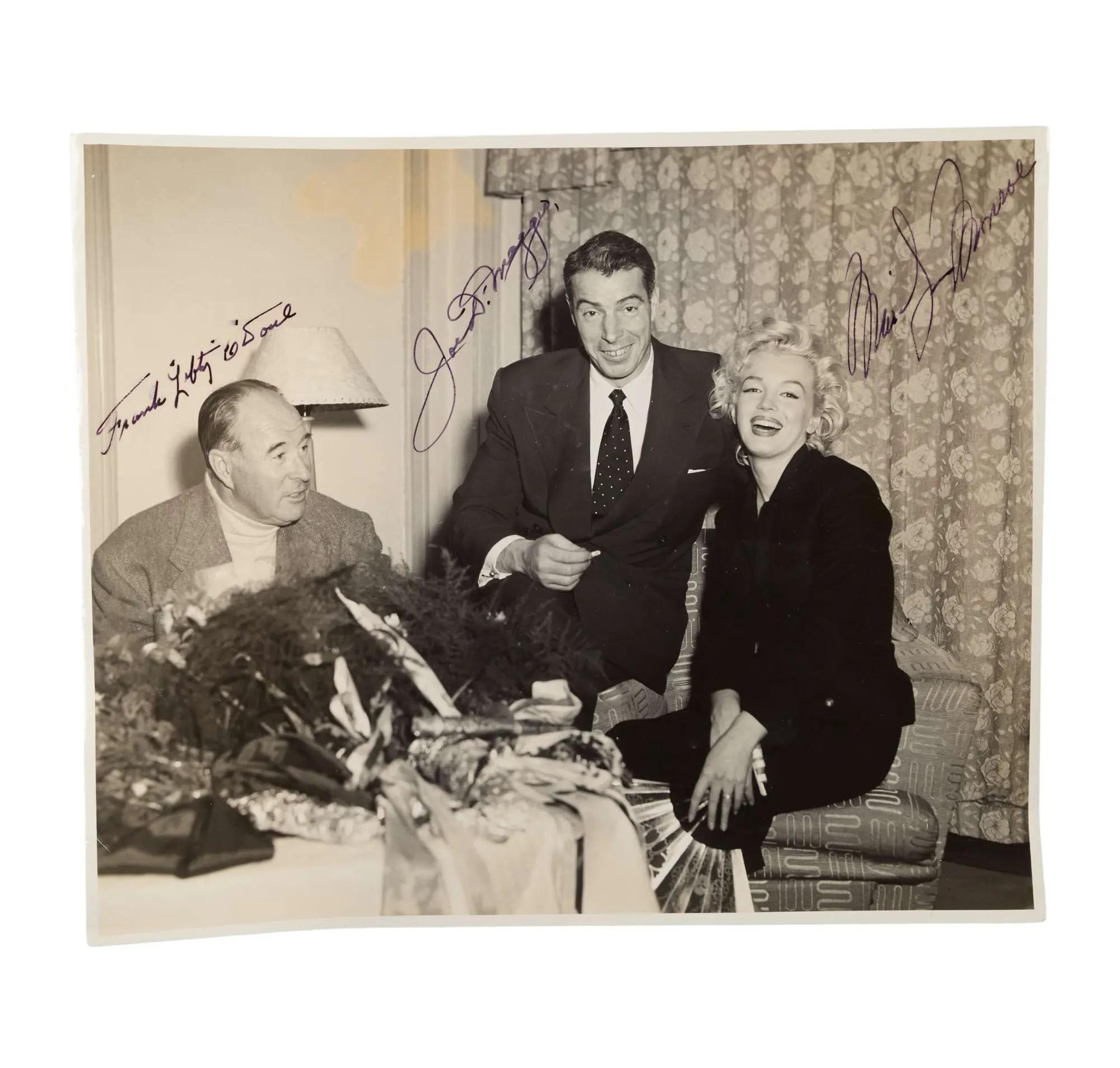 Lot #115. Marilyn Monroe and Joe DiMaggio, Et Al. | 1954 Signed Black and White Photograph Lot #115 Marilyn Monroe and Joe DiMaggio, Et Al. 1954 Signed Black and White Photograph